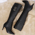 Vigdis black lace-up boots with double buckle straps