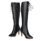 Vigdis black knee-high boots showing the inside zip