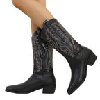 Wilhelmina black cowboy boots worn, side view