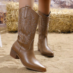 Wilhelmina brown cowboy boots worn, front view