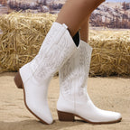 Wilhelmina white cowboy boots worn, front view