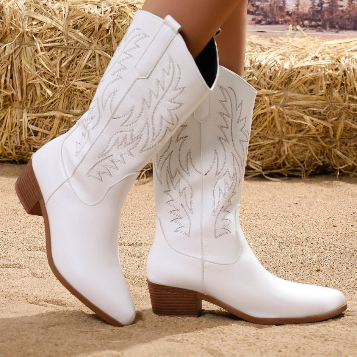 Wilhelmina white western boots worn, walking