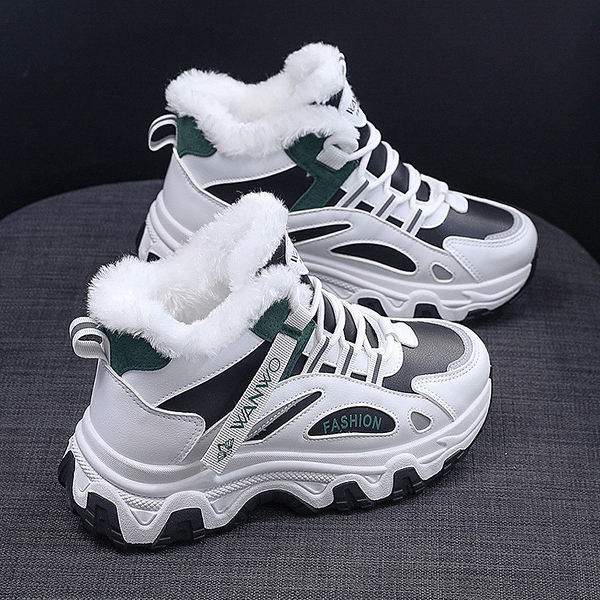 Ylva black and green high-top trainers with faux-fur collar